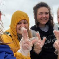 4 female students show their Laker pride